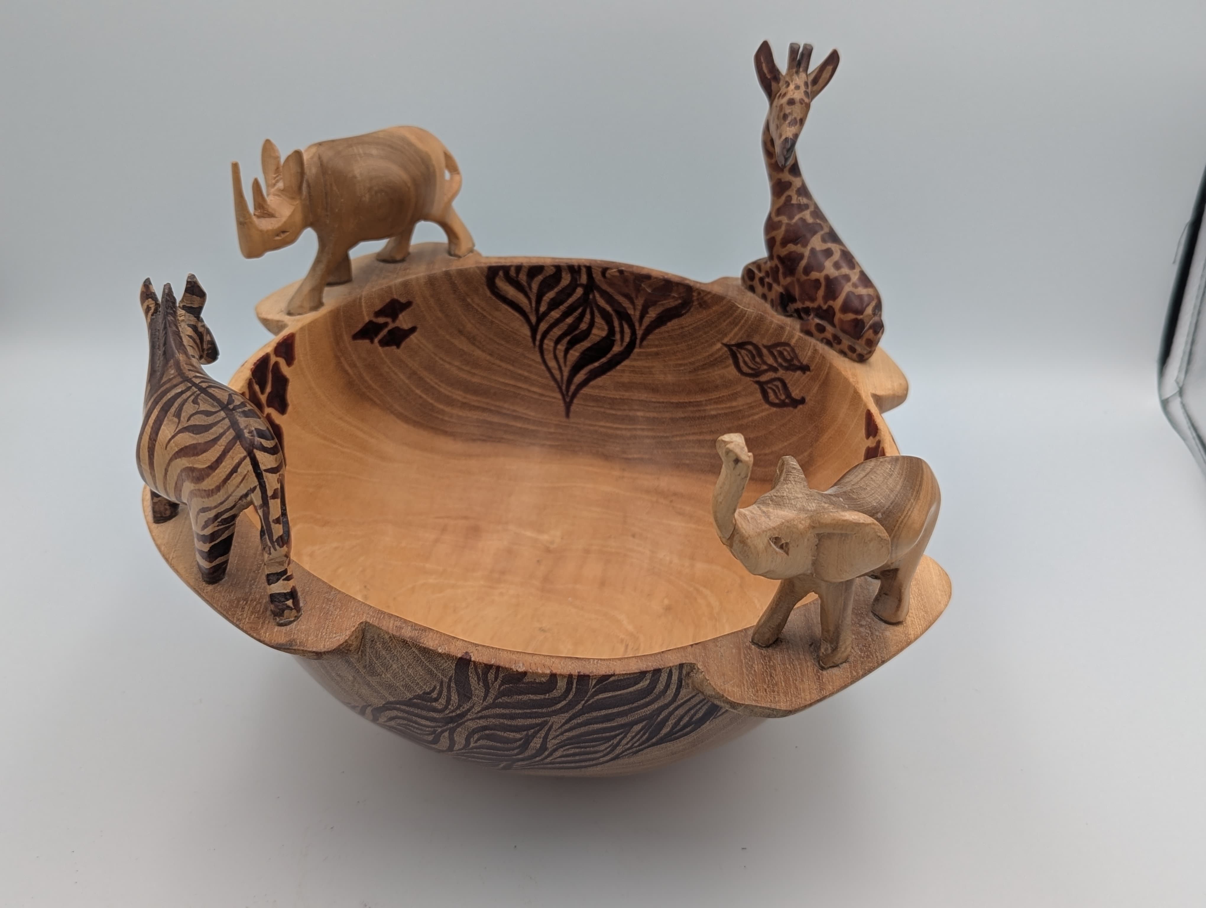 Elephant, zebra, rhino, and giraffe.