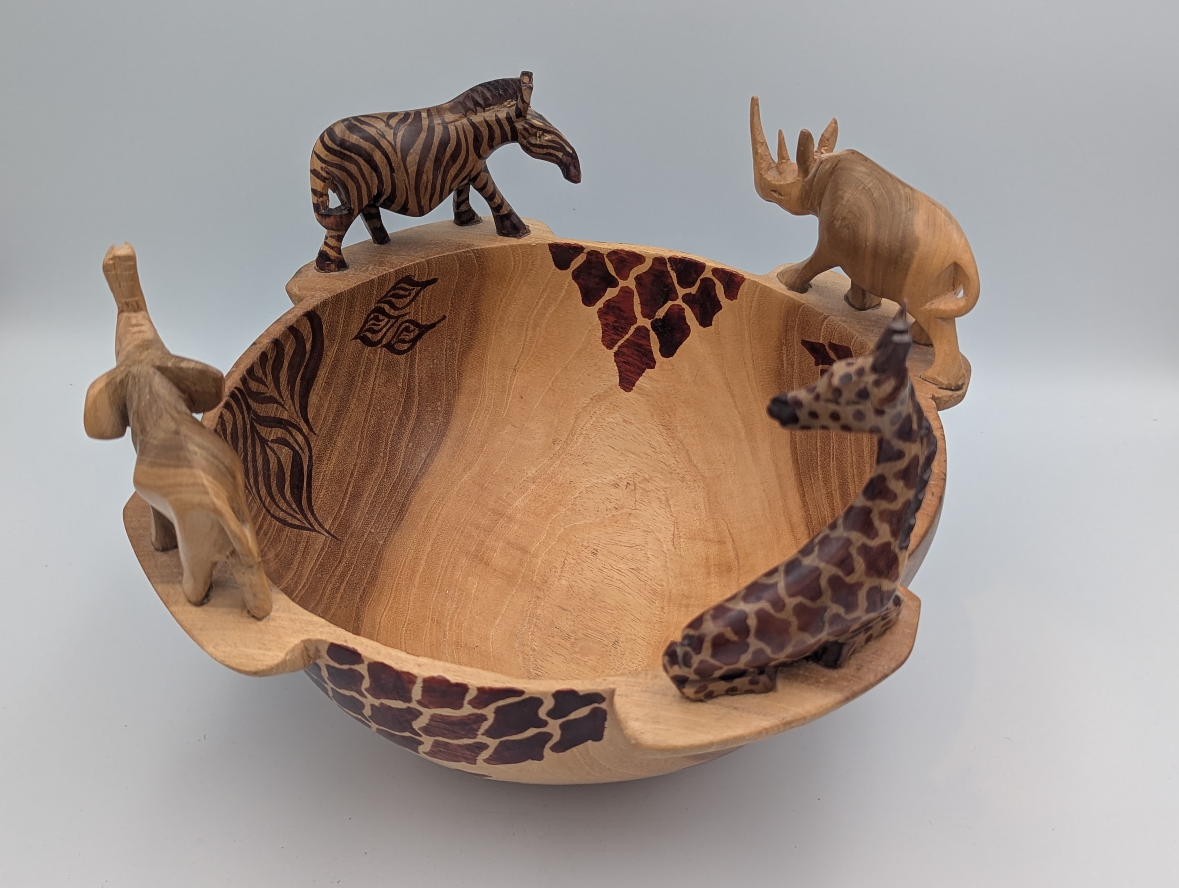 Beautiful, hand-carved bowl and animals.